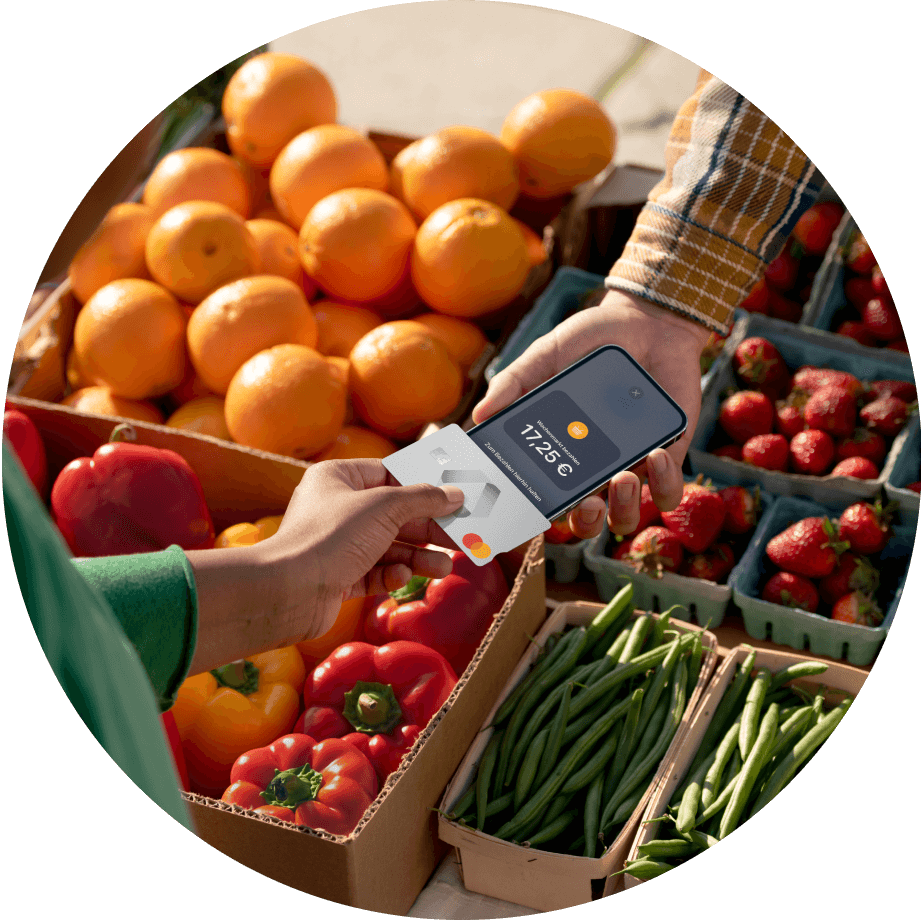 Person making mobile payment in farmer's market